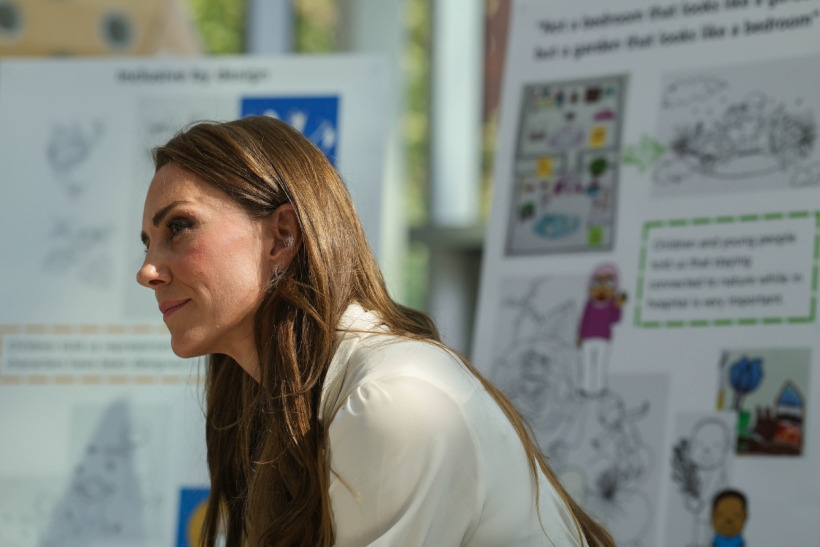 Kate Middleton speaking with staff during her visit to Evelina London Children's Hospital