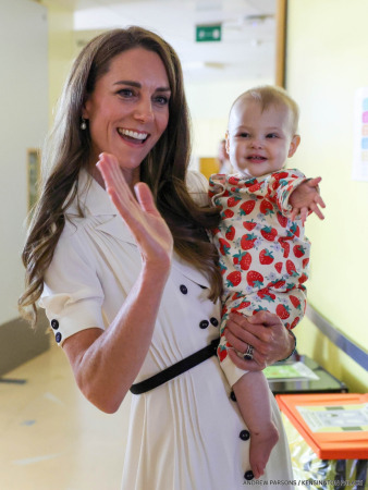 Kate Middleton holding a baby at Evelina London Children's Hospital