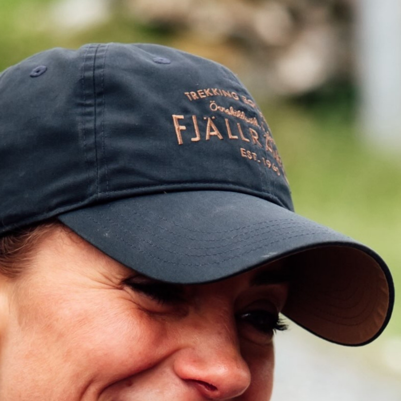 Kate Middleton wearing the dark navy Fjällräven Est. 1960 cap with her red North Face shorts