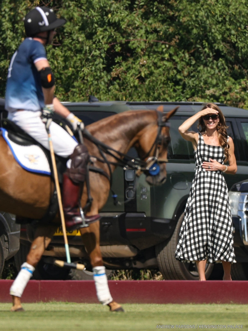 Kate Middleton watching Prince William play polo from the sidelines