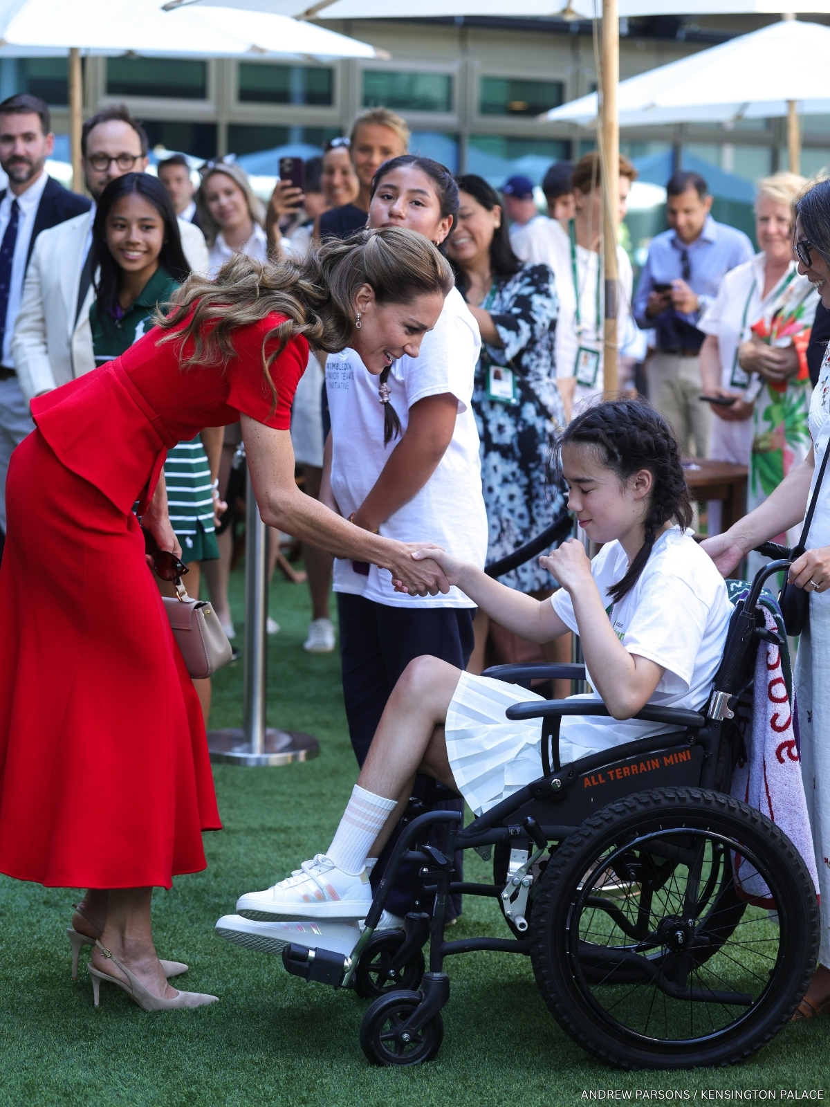 Kate shaking hands with Thea