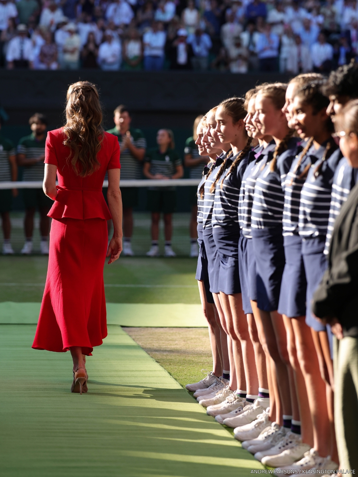 Kate Middleton at the 2026 Wimbledon Ladies' Singles Final, walking away showing the ball boys and girls in their Ralph Lauren uniforms