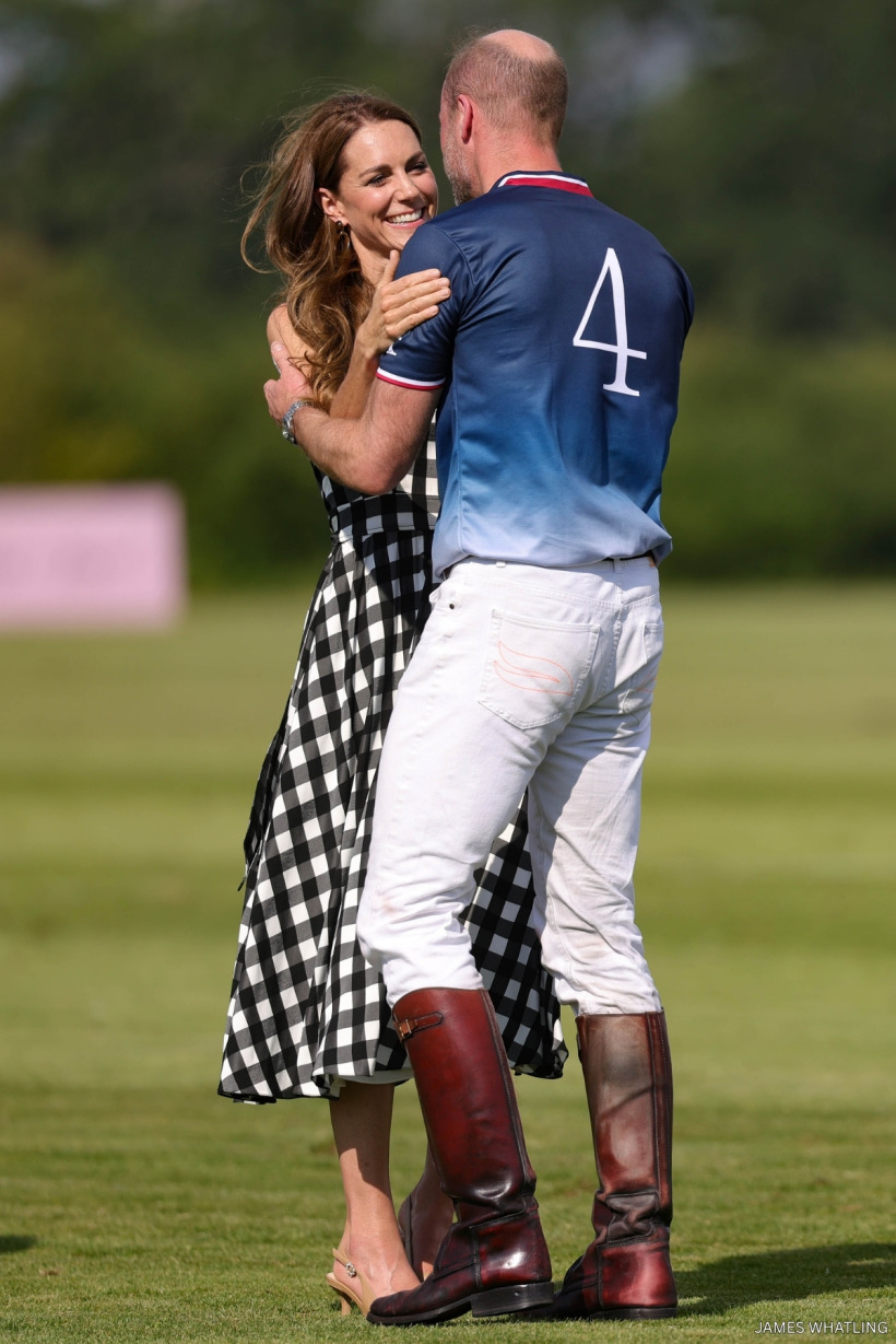 Prince William and Kate Middleton embracing after the polo match