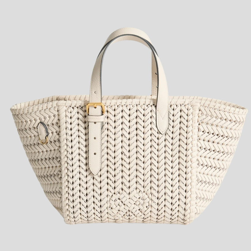 The Anya Hindmarch Neeson tote in chalk, showing the woven bow detail at the front