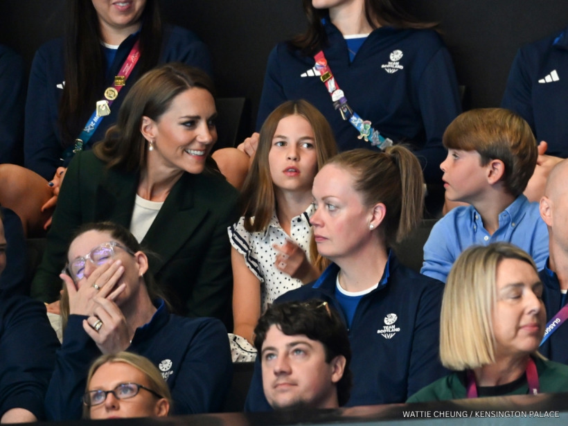 Kate Middleton talking to Prince Louis in their seats at The Hydro